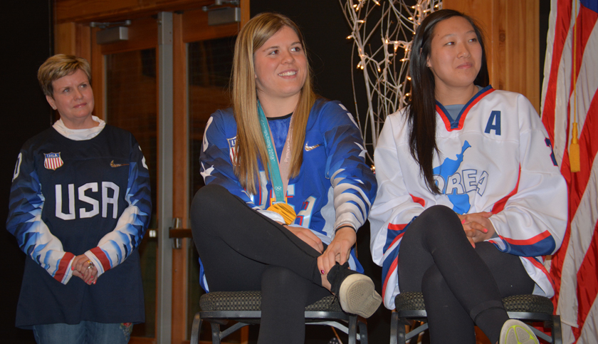 Sisters and Olympic Women's hockey team athletes, Hannah and Marissa Brandt at their hometown reception in Vadnais Heights, Minnesota with their mother, Robin Brandt looking on.