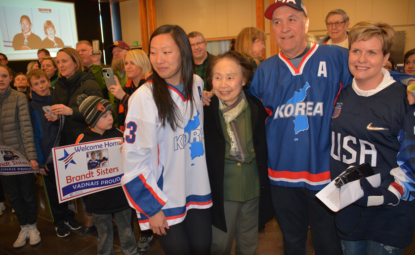 Marissa Brandt, Hyun Sook Han and Marissa's parents Greg and Robin Brandt.