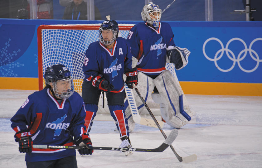 Marissa Brandt (center) plays with Team Korea against Japan in the 2018 Winter Olympics in Pyeongchang, South Korea.