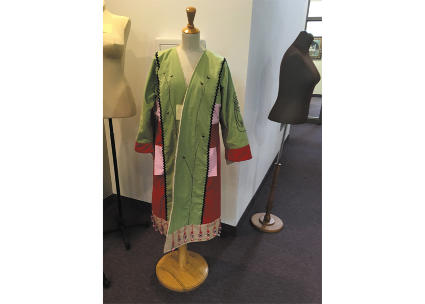 Artist Dawn Tomlinson and her jacket she designed using inspiration from her Korean heritage.