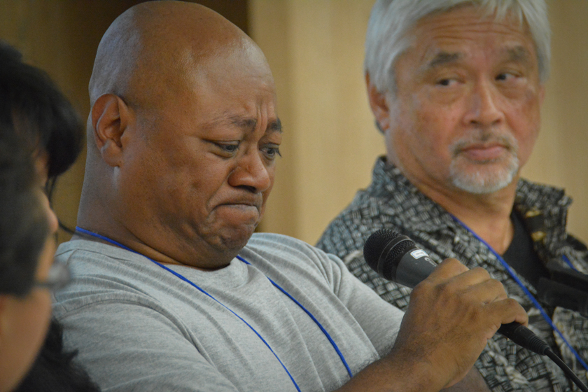 Adopted Korean Mosiac Hapa tour conference panelist Chang Lee Nielsen of Denmark with Samuel Townsend looking on.