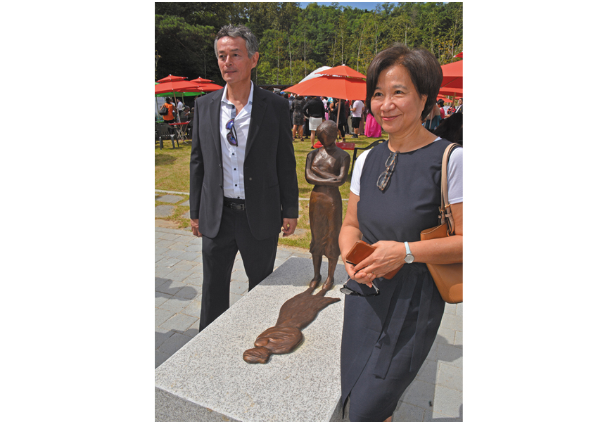 Adopted Korean Mosiac Hapa tour:  Thomas Park Clement and artist Wonsook Kim who created the sculpture "Shadow Child" for Omma Poom Park, Paju, South Korea.